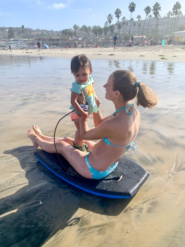 Boogie Board at Beach- mom and baby.