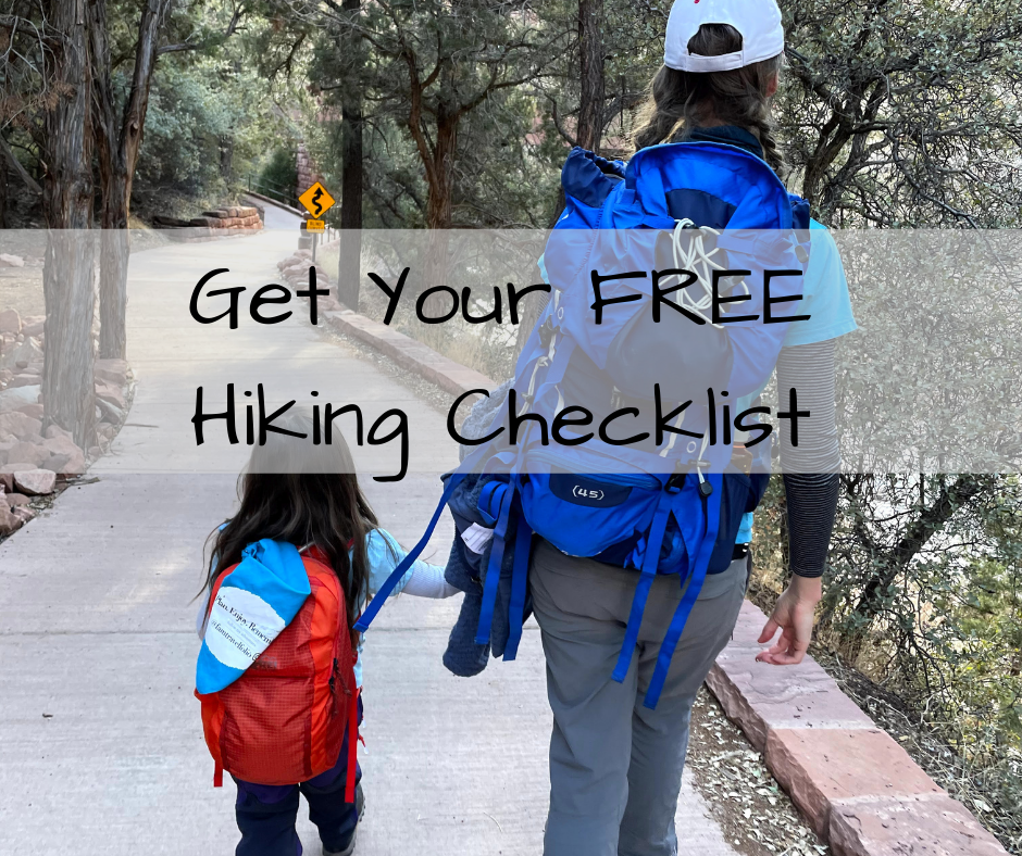 Image of mom and daughter hiking with hiking backpacks on. Click to get your free hiking checklist download.