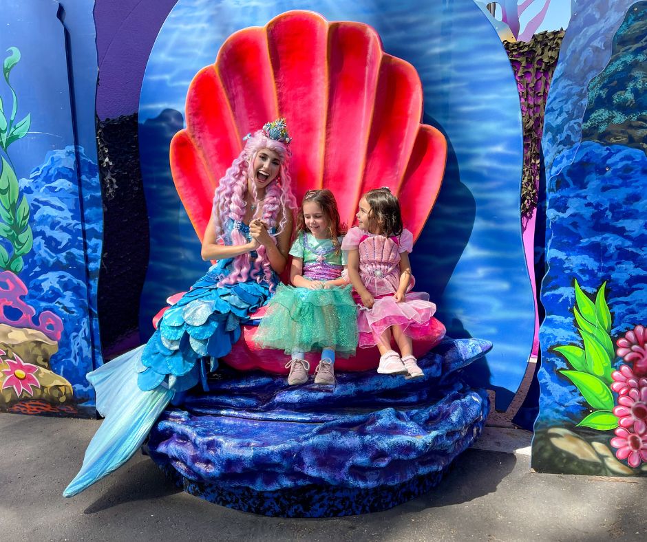 Picture of 2 girls with Mermaid in seashell chair