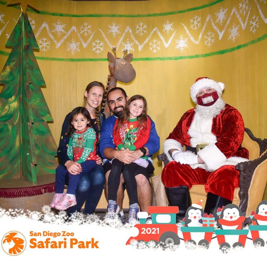 Photo of family of 4 with Santa at Safari Park.