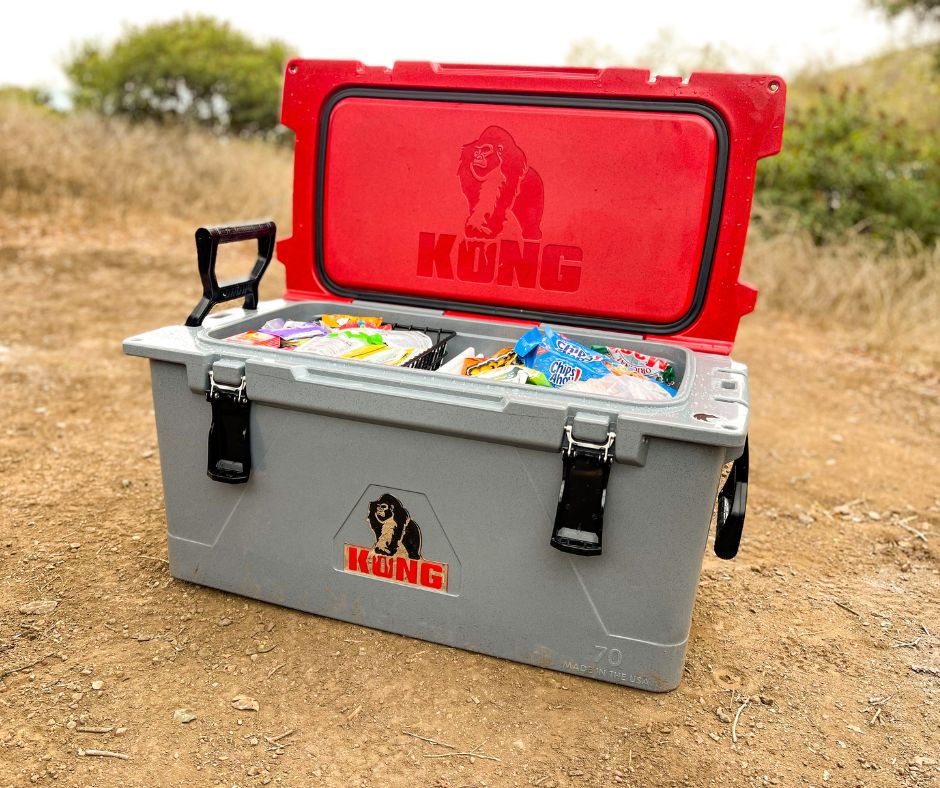 Kong 70 Cooler, red lid open with food inside