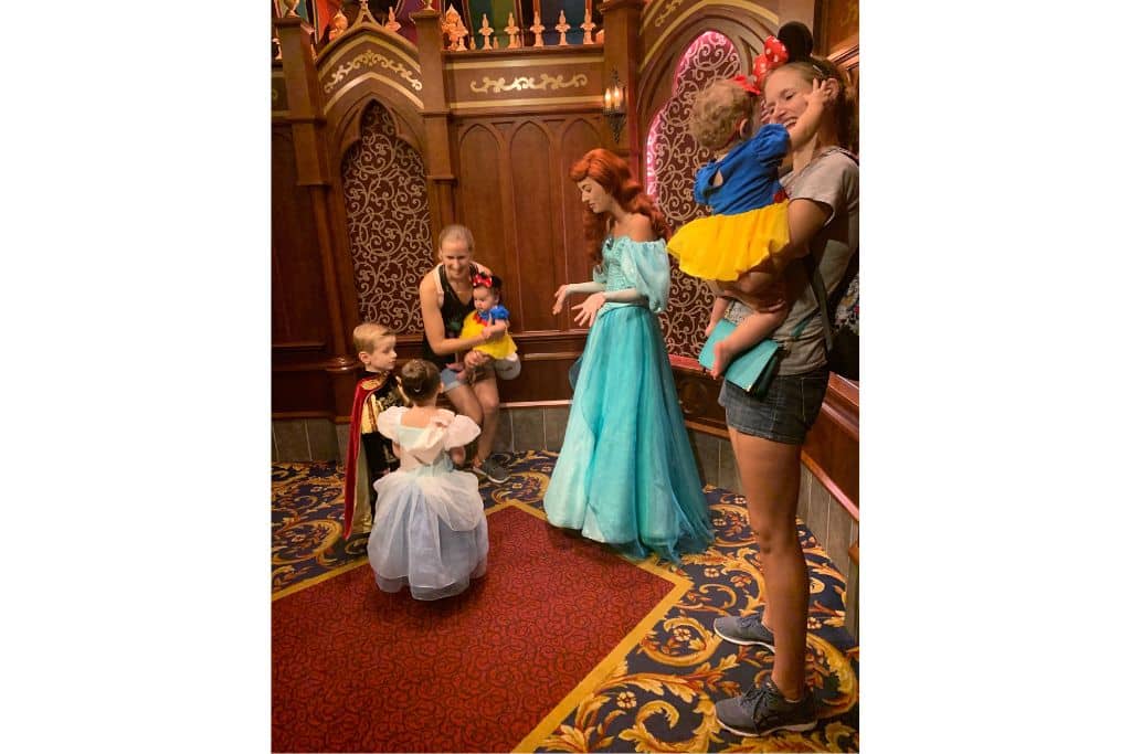 Toddler boy and girl and 2 baby girls meeting Ariel at Royal Hall