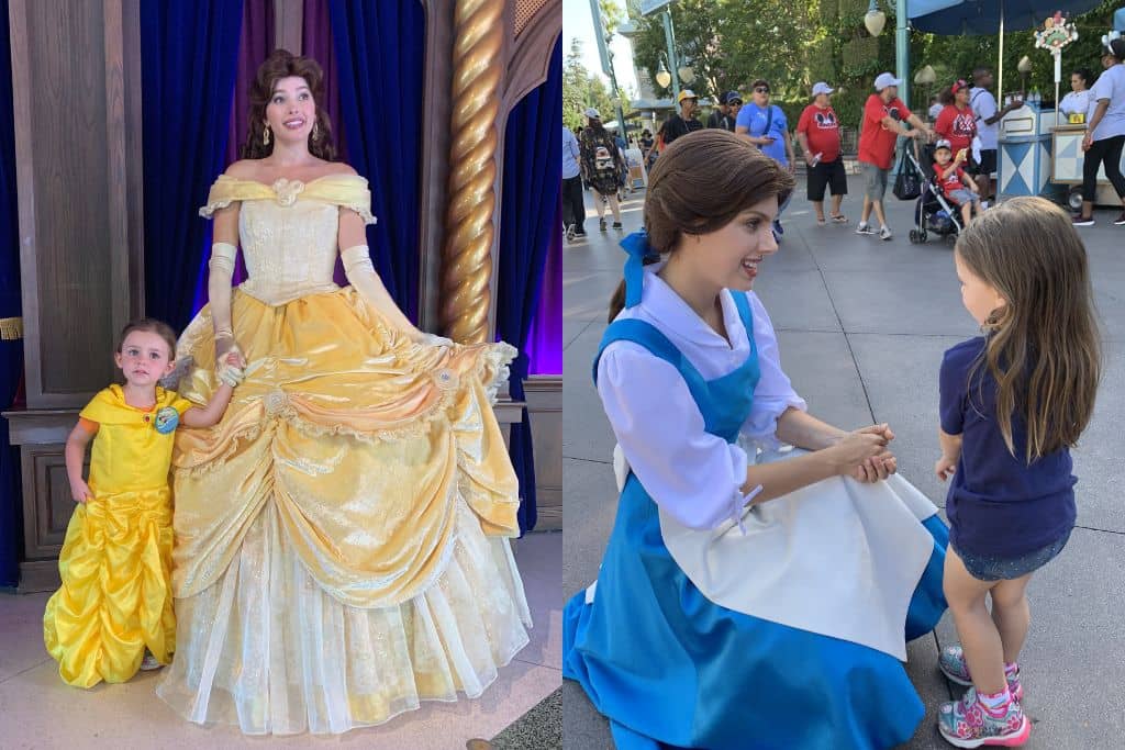 Toddler girl meeting Belle in Yellow and Blue Dress at Disneyland