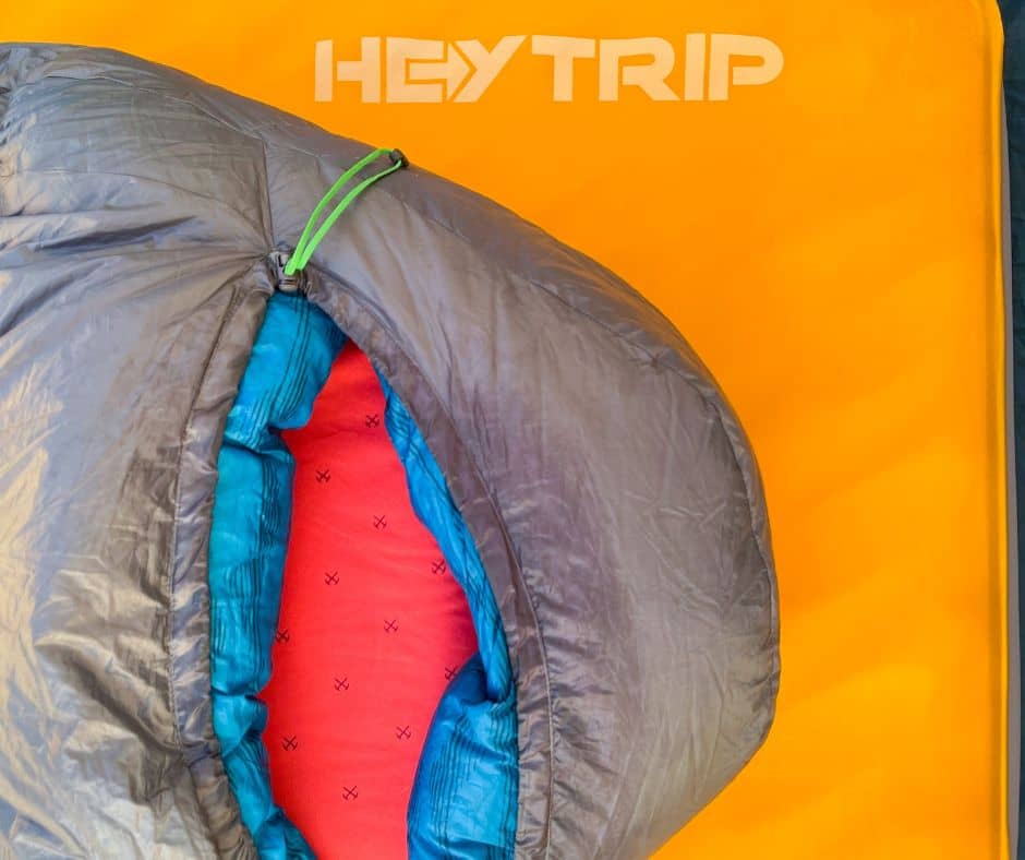 Top part of HeyTrip Sleeping Mattress with sleeping bag on top