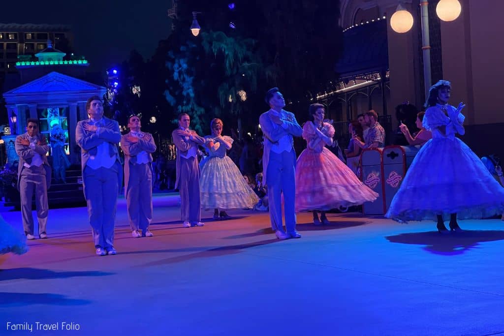 Haunted Mansion ballroom ghosts dancing in Mickey's Frightfully Fun Halloween Parade