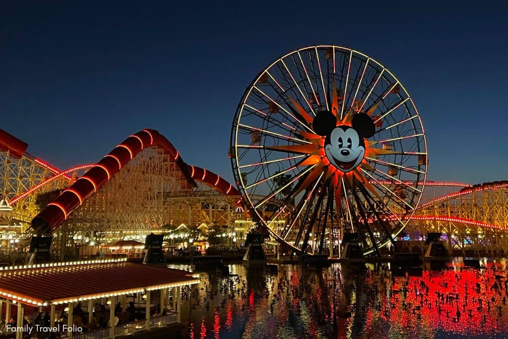 World of Color lights with Mickey's Pal A Round and Incredicoaster in the background.