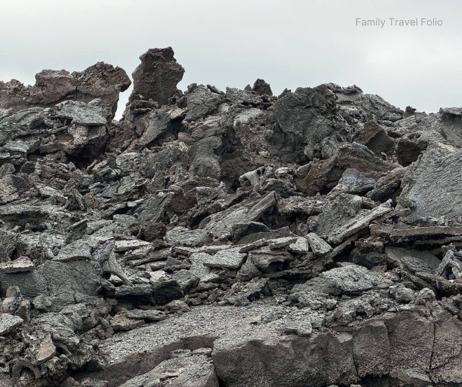 Close-up of jagged black lava rocks along Iceland’s Golden Circle, an otherworldly landscape often explored by travelers looking for unique things to do in Reykjavik.