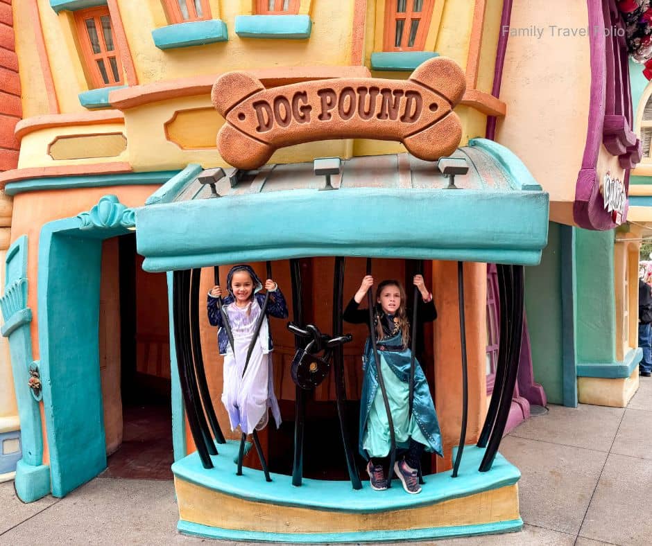 Kids playing inside the Dog Pound area in Mickey’s Toontown at Disneyland, a fun spot for families booking discount Disneyland tickets